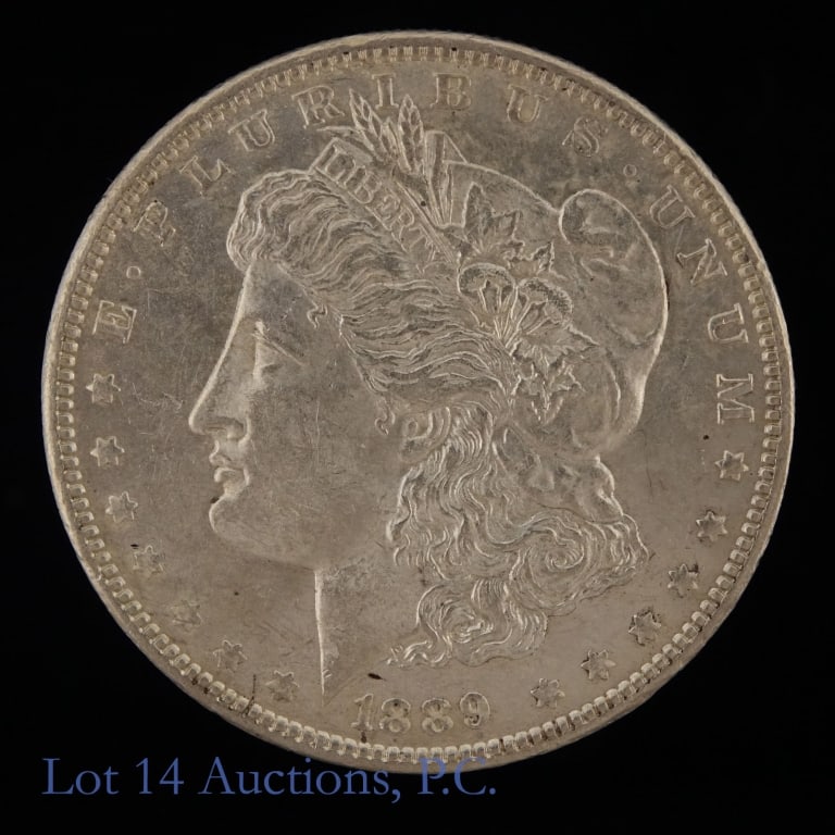 1889 (P) USA Silver Morgan Dollar (BU*): 1889 (P) United States silver Morgan dollar (Philadelphia Mint). Designer is George T. Morgan. * Per consigner, in BU condition. Metal is 90% silver and weighs 26.73 grams. Greysheet wholesale price
