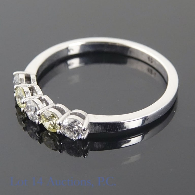14k White Gold Multi Color Diamond Ring: Size 6 ring made with 14k white gold, decorated with three diamonds and two yellow diamonds (0.30 cttw diamonds, 0.20 cttw yellow diamond). Total weight of ring is approximately 1.68g. Identification