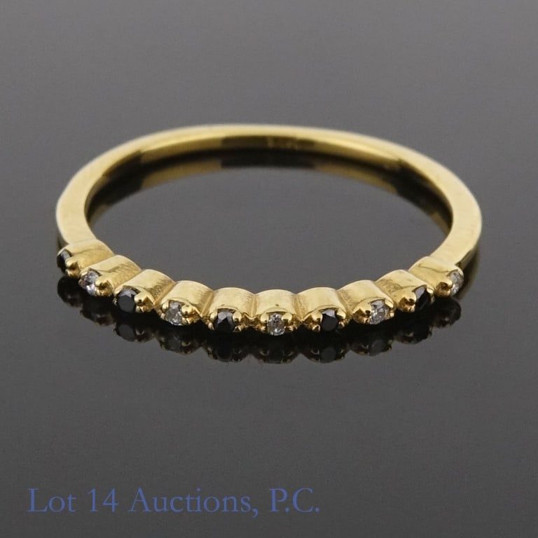 14k Yellow Gold & Diamond Ring: Size 6 delicate ring made with 14k yellow gold, decorated with natural diamonds and treated blue diamonds (0.03 cttw diamond, 0.02 cttw blue diamond). Total weight of ring is approximately 0.84g.