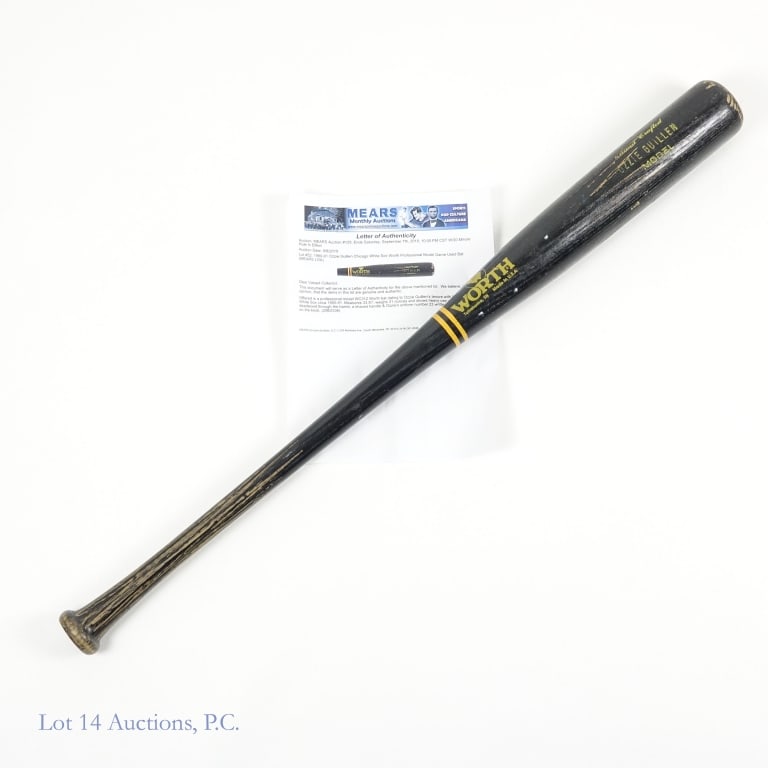Ozzie Guillen Game Used Baseball Bat (Mears LOA): Professional model Worth (WC312) black baseball bat - Ozzie Guillen model. Approximately 33.5" long. Knob is embossed "OG" and "3-1/2". Bat shows considerable wear, including modifications