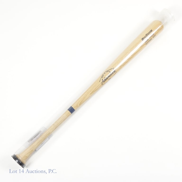 Hank Aaron Signed Baseball Bat (SGC): Adirondack P302 Big Stick Hank Aaron professional model blonde baseball bat. Beneath the barrel brand, Hank Aaron has signed in blue sharpie. The knob has a Sports card Guarantee Corporation