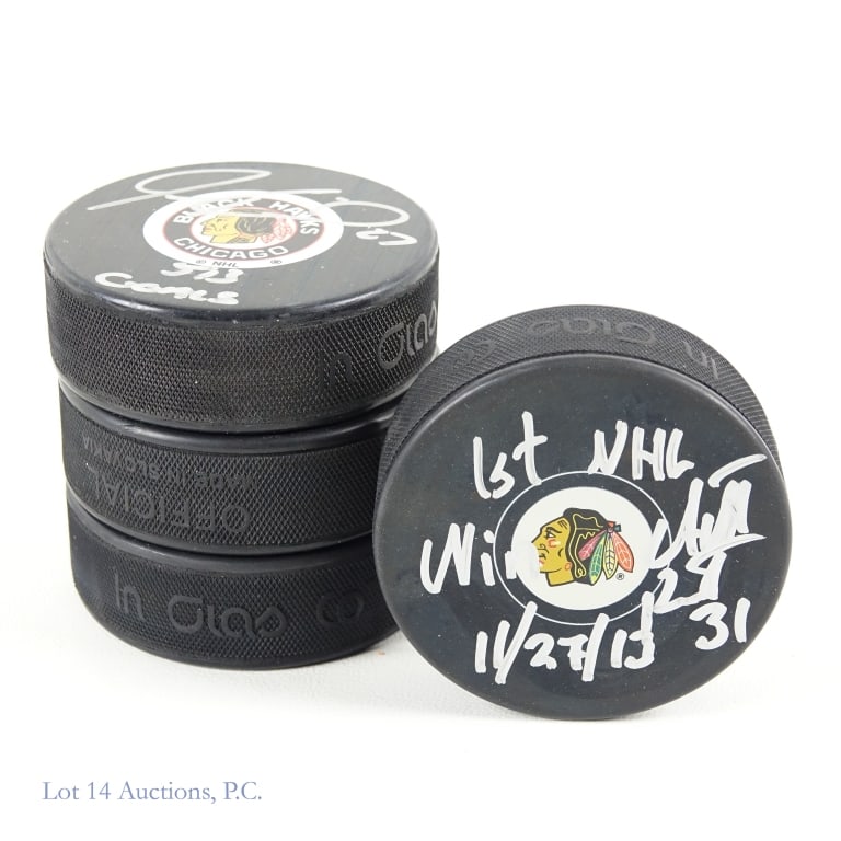 Blackhawks Milestone Signed Pucks (4) (1 of 3)
