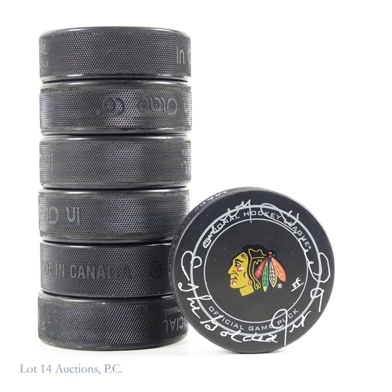 7 Pucks Signed By Former Chicago Blackhawks: Assortment of seven pucks signed by former Chicago Blackhawks players. Among the players in this group are Bobby Hull inscribed "The Golden Jet" *** Teuvo Teravainen with a PSA/DNA COA ***Jeremy