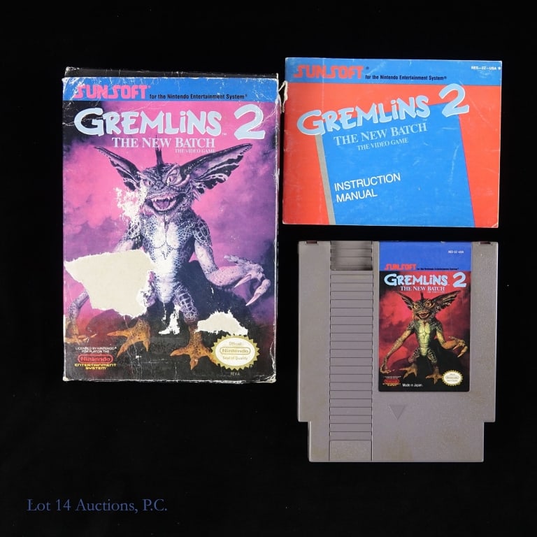 Nintendo NES Gremlins 2 The New Batch Game CIB: Nintendo Entertainment System NES Gremlins 2 The New Batch game in original box with manual. Box shows heavy wear and tear.