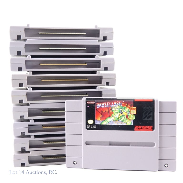 Super Nintendo SNES Games (10): Ten (10) Super Nintendo SNES game cartridges - Bugs Bunny Rabbit Rampage, Battle Clash, Zoop, Timon & Pumbaa's Jungle Games, Pilotwings, Clue, Yoshi's Cookie, Space Invaders, Super Smash TV, and Denni