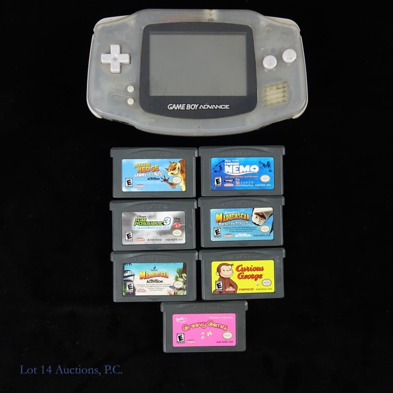 Nintendo Game Boy Advance T&W With Games (7): Clear Glacier Nintendo Game Boy Advance console with seven (7) game cartridges - Madagascar, Madagascar Operation Penguin, Finding Nemo, Kim Possible 3, Curious George, Groovy Games, and Over the Hedg