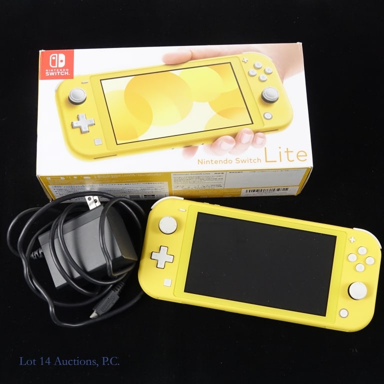 Nintendo Switch Lite Yellow In Japanese Box T&W: Yellow Nintendo Switch Lite with original charger. Original Japanese box is included with a tear in flap on one side. Manuals not included. Tested and working per consigner.