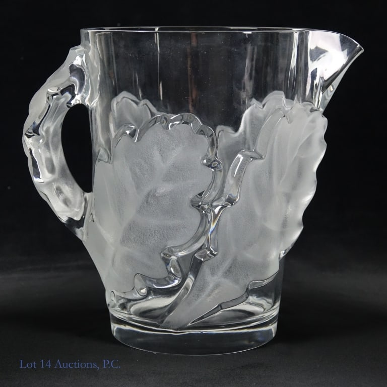 Lalique "Chene" Crystal Pitcher: Vintage pitcher with a famous discontinued pattern signed Lalique. From their "Chene" (or "Oak" in English) series, this is a large glass pitcher with four frosted oak leaves wrapped around a