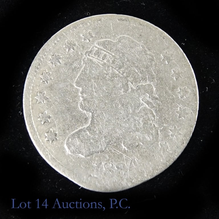 1834 US Silver Capped Bust Half Dime: 1834 United States silver capped bust half dime (Philadelphia Mint). Designer is William Kneass. Metal is 89.2% silver and weighs 1.35 grams. Mintage is 1,480,000 with a PCGS survival estimate of 2,25