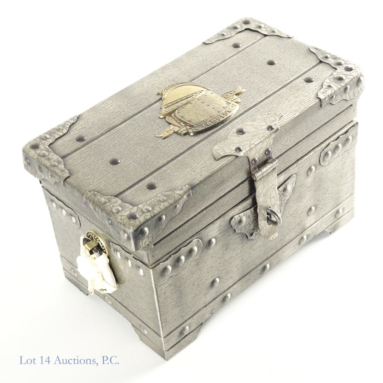 Camelot Scotch Set, Chest Decanter, 6 Glasses: New condition "Camelot" chest with glass decanter, "Scotch" neck tag, stopper, 6 glasses, rack and lock. Approximately 10w x 5.5d x 6"h.