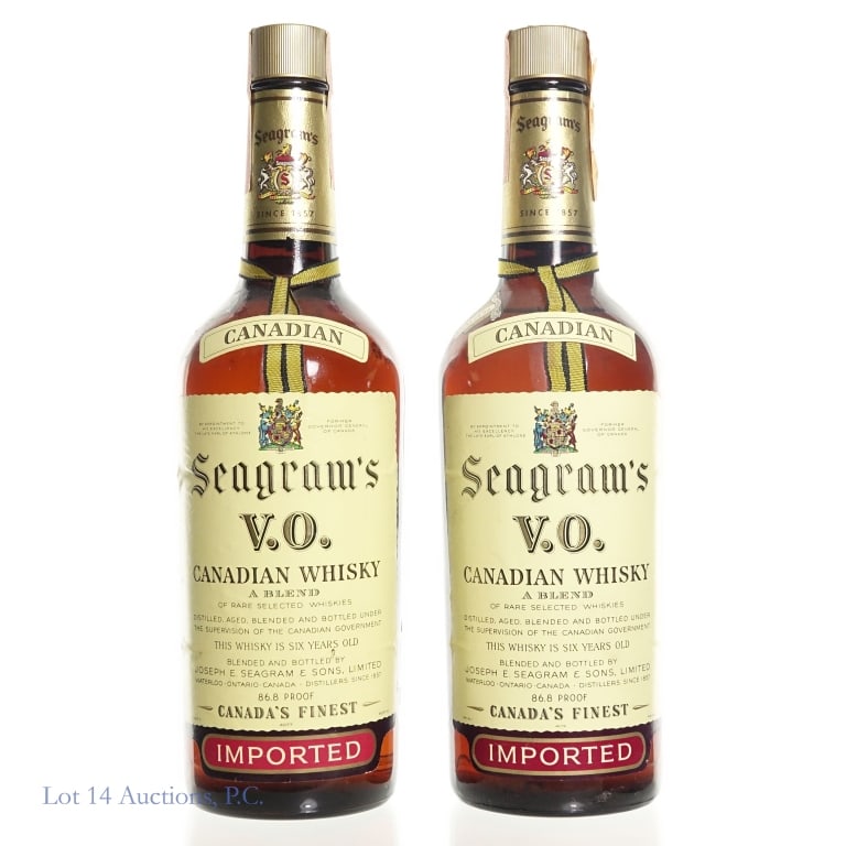 1960s Seagram's V.O. Blended Canadian Whisky (2): Two bottles Seagram's V.O. blended Canadian whisky. 6 years. 86.8 proof. 4/5 quart. Each has two tax strips, one Canadian and one American. The American strips are Series 112, and seems to be from bet