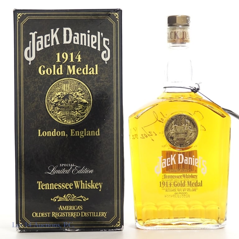 Jack Daniel's 1914 Gold Medal Tennessee Whiskey: Jack Daniel's 1914 Gold Medal London, England Tennessee Whiskey, 90 Proof, 750 ml, Bottle #133808. Original box included, box creased in places but in fair condition overall.