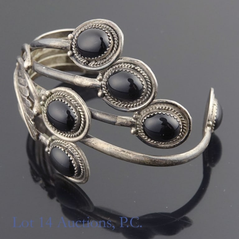 Native American Style Cuff Bracelet, Test Sterling: Native American style sterling silver cuff bracelet, approximately 5.5" diameter and 42.5 g - 1.37 ozt. weight. Bracelet acid tests as sterling silver but is not marked. Lot 14 does not guarantee this