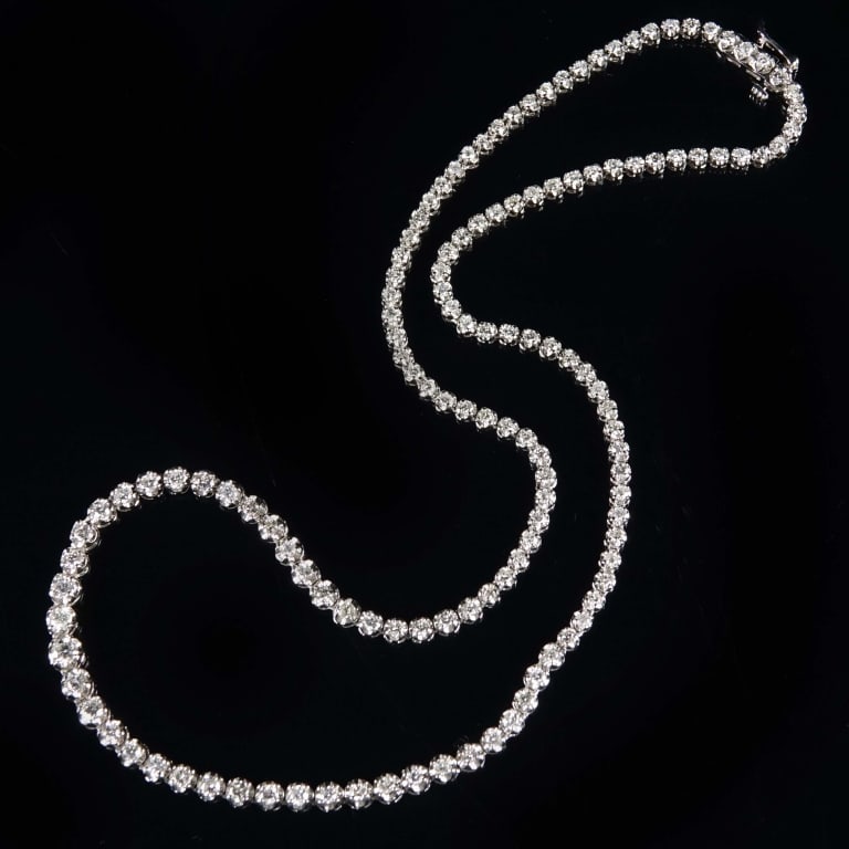 14k White Gold Eternity Necklace w/ Diamonds & ID: 14k white gold eternity style necklace decorated with over 100 diamonds (7.05 cttw). Total weight of necklace is approximately 23.14g, and it measures approximately 18.5" long. Identification and appr