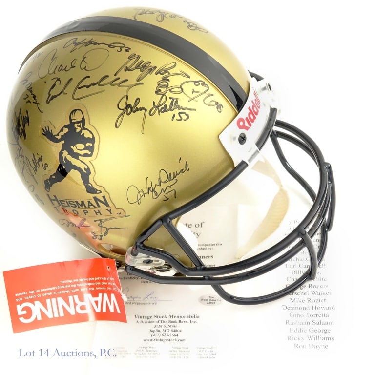 Auth FS Heisman Trophy Helmet 19 Sigs Berwanger: Riddell gold metallic On-Field Authentic full size football helmet (Warning tag still attached) with the logo of the Heisman Trophy on both sides. Signed in black sharpie by nineteen recipients of the