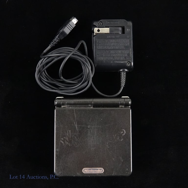 Nintendo Game Boy Adv SP Who Are You System (T&W): Nintendo Game Boy Advance SP handheld video game system - "Who Are You?" special edition. Includes AC adapter. Tested & working. Cover logo is almost completely gone. Noticeable wear - including scrat