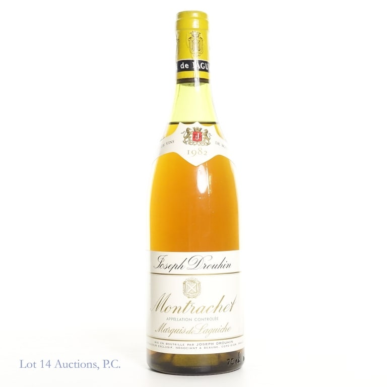 1982 Joseph Drouhin Montrachet Marquis de Laguiche: 1982 Joseph Drouhin Montrachet Grand Cru Marquis de Laguiche. 750ml., no stated abv. Some sediment visible and some minor damage to capsule. Please see photos for fill level, details and condition of 