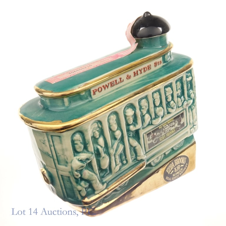 1968 Ezra Brooks 12 Yr. Cable Car Decanter Bourbon: 1968 Ezra Brooks 12 Years Old Bourbon San Francisco Powell & Hyde Cable Car decanter. 4/5 Quart, 90 Proof. Weight approximately 3.325 lbs. 1968 mold on the bottom of decanter. Tax strip torn in transp