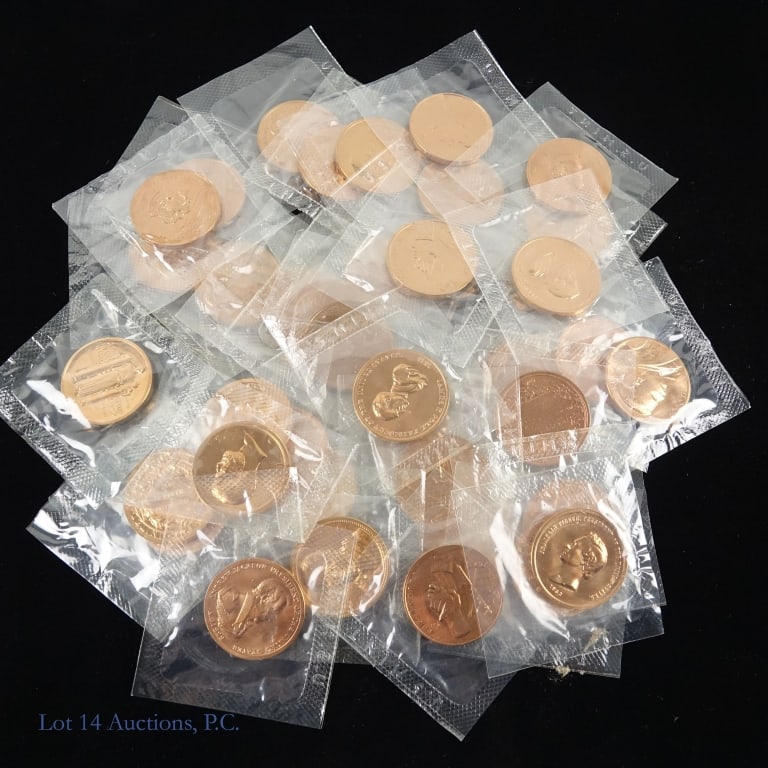 U.S. Mint Bronze Presidential Medals - 34 MM (39): Thirty-nine (39) United States Mint bronze presidential medals in blister packs. Diameter measures 34 mm (1 1/4 inch). ***Lot 14 Auctions is not a professional numismatic grading agency. Consigner