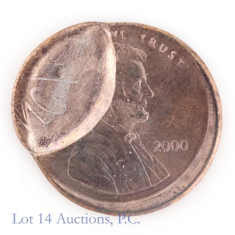 2000-P US Lincoln Cent Error (*GEM BU): 2000-P United States Lincoln memorial cent (Philadelphia Mint) with broadstruck with flip over partial brockage error. *Per consigner, an amazing error coin in GEM BU condition. *** Lot 14 Auctions