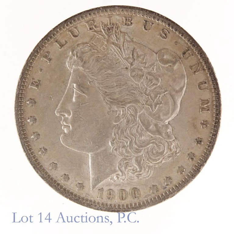 1900 (P) US Silver Morgan Dollar: 1900 (P) United States silver Morgan dollar (Philadelphia Mint). Mintage 8,830,000. Silver content confirmed on Lot 14 Auctions electronic metal verifier and weighs 26.67 grams on our electronic balan