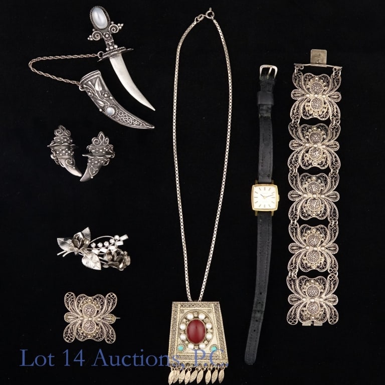 Jewelry (Sterling Silver + More): Southwestern US pendant on chain. Chain marked "925". Pendant tests electronically as sterling silver. Weight: 18.75 grams. *** Dagger brooch. Marked "sterling". Tests electronically as sterling silve