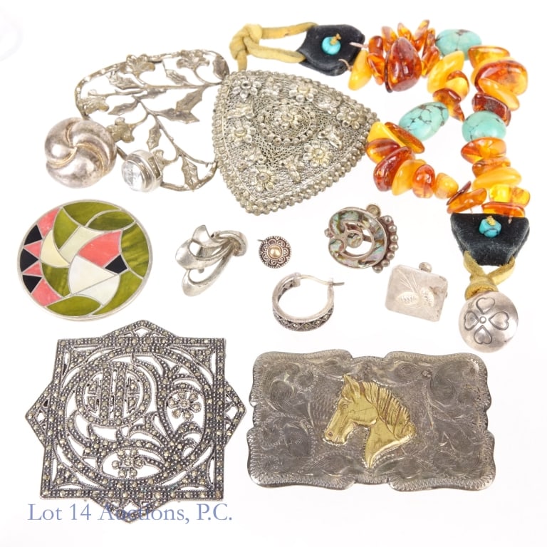 Sterling And Designer Jewelry Lot: Sterling silver belt buckle, brooch, 6 different earrings, pendant, and one more piece. Total weight approximately 85.6g - 2.75 ozt. *** Two strand amber and turquoise bracelet (~7.5") *** Tomeco Slov