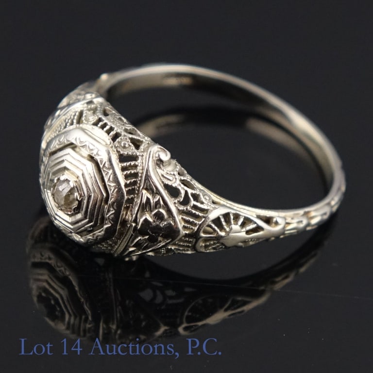 Antique 18k White Gold SMCO Diamond Ring: Size 7 18k white gold ring with a 1/8 ct diamond in the center. Ring is stamped "18k" and "SMCO" on the inside. Total weight of ring is approximately 2.46g.