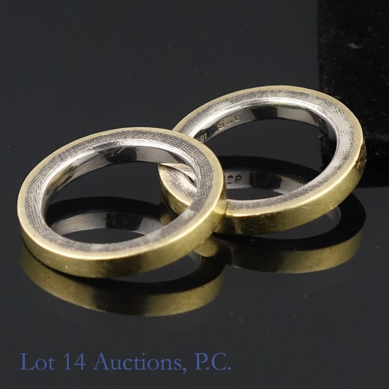 Rene. E. 18k Y. Gold and Silver Vermeil Rings (2): Two (2) rings: sterling silver with yellow gold overlay. Marked: "Rene. E. 925 18K". Size: 7.5 (both). Weight: 7.65 grams and 7.85 grams. Tests electronically for 18 karat gold.