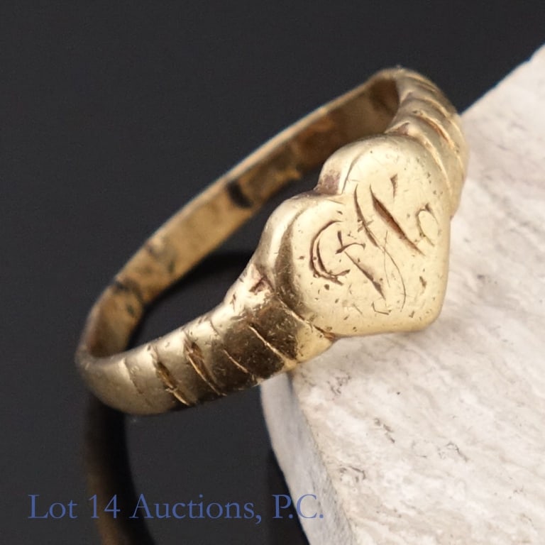 14K Y Gold Monogram Ring: Yellow gold monogram ring. Monogram is heavily faded. Markings are unreadable. Signs of resizing. Tests electronically as 14 karat gold. Size: 6. Weight: 2.85 grams.