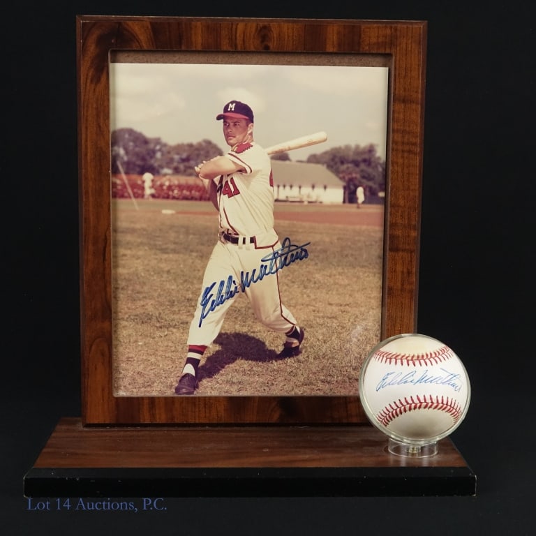 Eddie Mathews Signed Photo & Baseball JSA AHLOA: Wooden display containing an Eddie Mathews signed 8x10 photo and an Eddie Mathews signed baseball. The photo was signed with a blue Sharpie type pen. The Official National League (Coleman) baseball wa