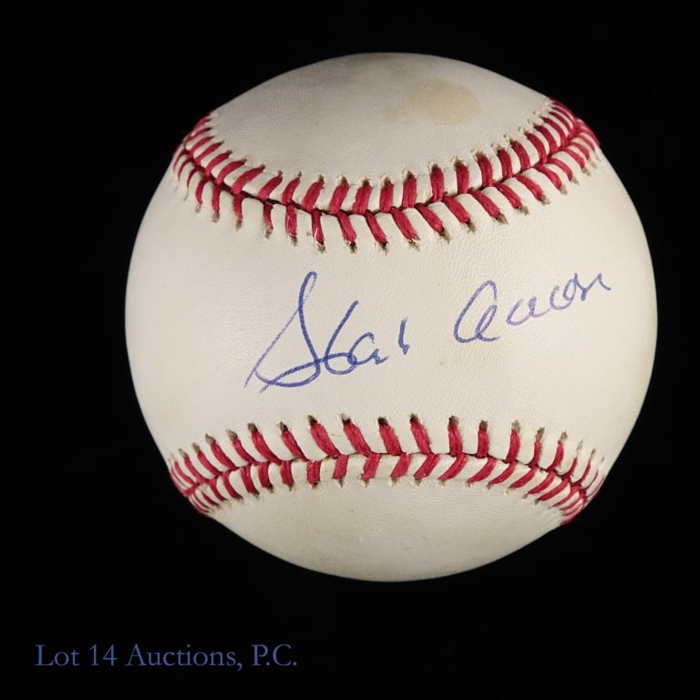 Braves Hank Aaron Signed Baseball PSA COA: ONL White baseball signed by Hank Aaron. Aaron used a blue ballpoint pen to carefully sign across the sweet spot. This vintage baseball has an off white color across the entire ball with a couple of