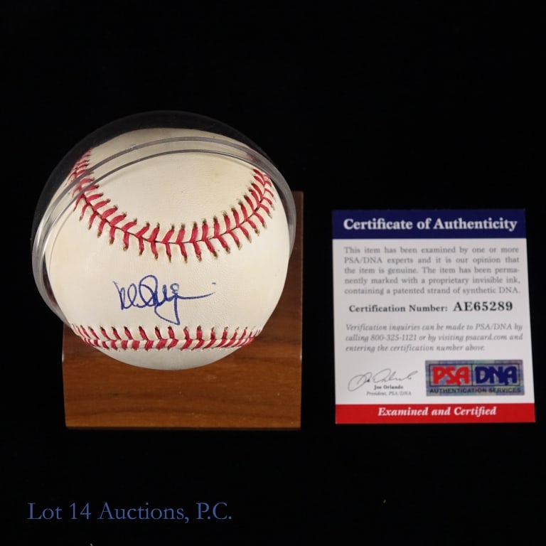 Mark McGwire Signed Baseball With PSA COA: OAL Brown baseball signed across the sweet spot by Mark McGwire. McGwire used a blue ball point pen to sign his name and the signature has been authenticated by PSA/DNA (cert number AE65289). The
