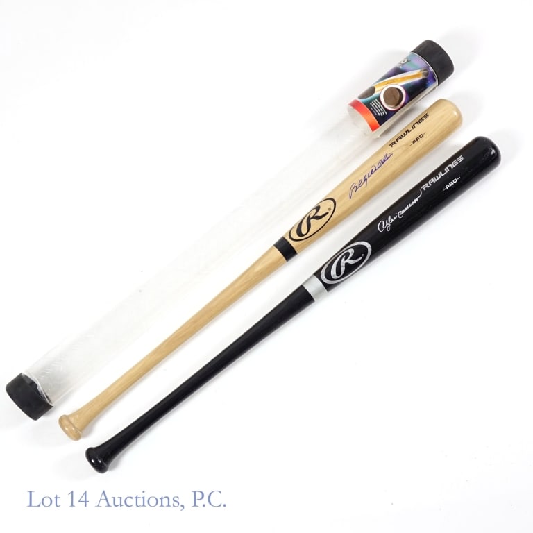 Billy Williams & Andre Dawson Signed Bats (2): Two Rawlings Pro style bats, one signed by Billy Williams and the other signed by Andre Dawson. Billy Williams signed with a blue Sharpie type pen across the barrel of a blonde bat while Andre Dawson 