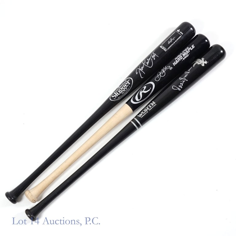 White Sox Guillen Crede Garcia Signed Bats (3): Three baseball bats each signed by a former White Sox player. The highlight of this group is a Worth White Sox model bat signed by Ozzie Guillen with a silver marker. Also included is a Louisville Slu