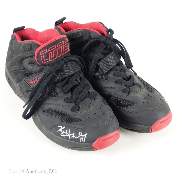 Kirk Hinrich Signed Converse (SAMPLE) Shoes AS IS: One pair of Converse size 13 shoes marked as SAMPLE inside the tongue of the shoe. Hinrich signed the side of each shoe with a silver marker. The shoes exhibit wear but we do not know if they are