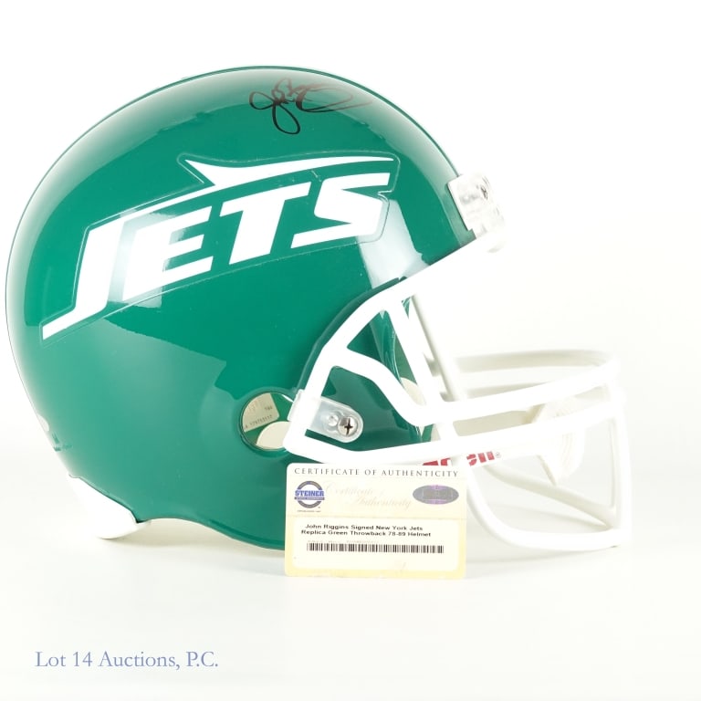 John Riggins Sig FS NY Jets Helmet (Steiner): Riddell full sized replica 1978-89 throwback New York Jets helmet. Signed on the right side in black sharpie by John Riggins. Steiner holographic sticker on back of helmet with accompanying COA card (