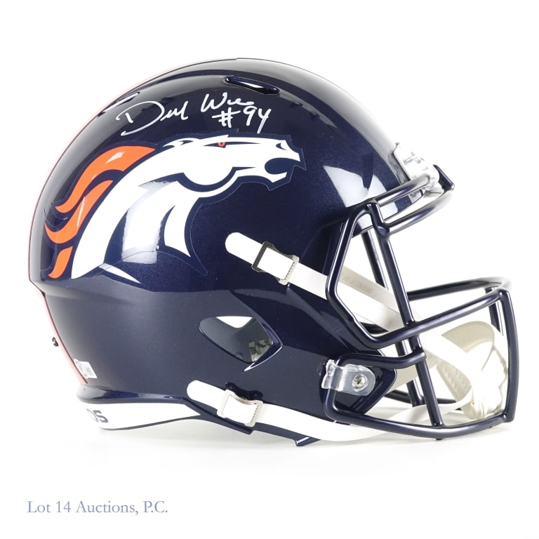 DeMarcus Ware Sig FS Den Broncos Helmet (Beckett): Riddell full sized replica Denver Broncos helmet. Signed on the right side in white by DeMarcus Ware. Beckett witnessed sticker on back of helmet (WY37417). We have verified these numbers at Beckett's