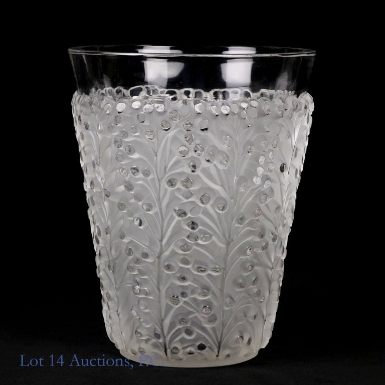 Lalique Saint - Tropez Vase: Lalique Saint - Tropez vase. Originally designed by Rene Lalique in 1937. Approximately 7" tall and 5.75" top diameter. One small chip in the middle and one tiny chip on the bottom rim. See photos