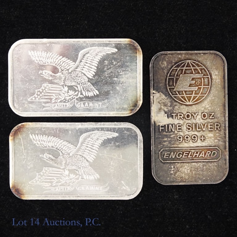 US Engelhard & Other 99%-Silver 1 Ozt Ingots, 3: Three (3) United States 1 ozt 99.9% silver bullion ingots as follows: ---Engelhard ingot (1); and ---Capital G & A Mint ingots (2). Silver content confirmed on Lot 14 Auctions electronic metal verifie