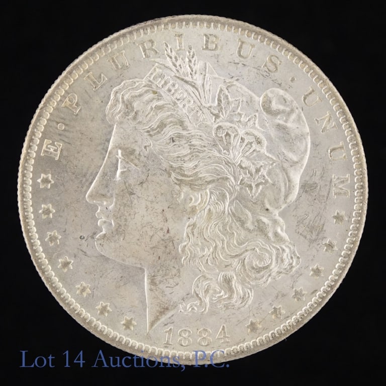 1884-O US Silver Morgan Dollar (*CH BU): 1884-O United States silver Morgan dollar (New Orleans Mint). *Per consigner, clean cheek in CH BU condition. Greysheet notes: " demand is strong for O-mint Morgan dollars." Metal is 90% silver. Minta