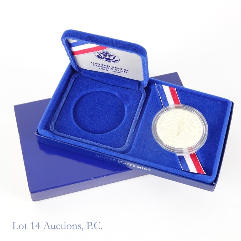 1986-S US Silver Liberty Comm Dollar in OGP: 1986-S United States silver liberty dollar (San Francisco Mint) in OGP with COA. Metal 90% silver (ASW 0.7734 ozt.) ***Lot 14 Auctions is not a professional numismatic grading agency. Consigner descri