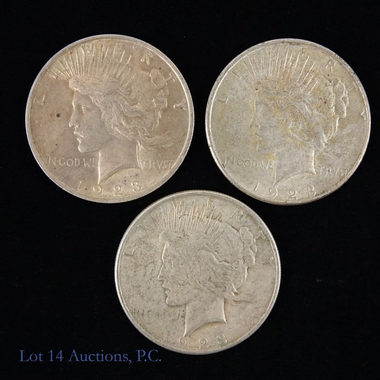 1923 P, D, S Silver Peace Dollars (3): Three (3) silver peace dollars (Philadelphia, Denver, San Francisco Mints). Designer is Anthony de Francisci. Metal is 90% silver, weighs 26.73 grams and measures 38.1 mm each coin. Dates and mintages