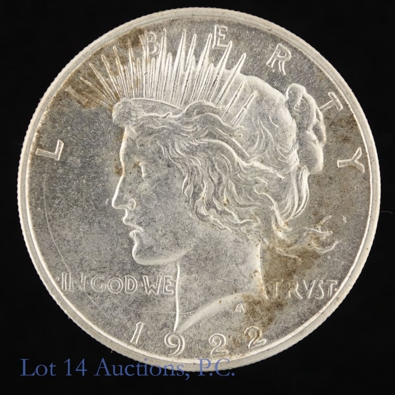 1922 (P) US 90%-Silver Peace Dollar (*BU): 1922 (P) United States silver peace dollar (Philadelphia Mint). *Per consigner, in BU condition with light toning. Metal is 90% silver. *** Lot 14 Auctions is not a professional numismatic grading age