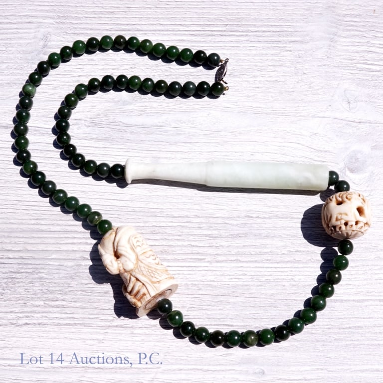 Jade / Jadeite Necklace 3 Feet, 8 Oz.: Jade or jadeite bead necklace with three carved ornaments. Two appear to be bone and the third appears to be jade / jadeite. Total length 35.5". Total weight 8 oz (224g / 7.2ozt). Bat shaped carving