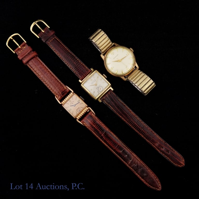 Lord Elgin, Gruen, John Wanamaker Watches (3): Lord Elgin hand winding wrist watch. 14K rose gold filled 20.5 mm case. Brown genuine lizard strap. Rose tone dial with black indices and hands, and seconds sub-dial at 6 o'clock. Watch is winding
