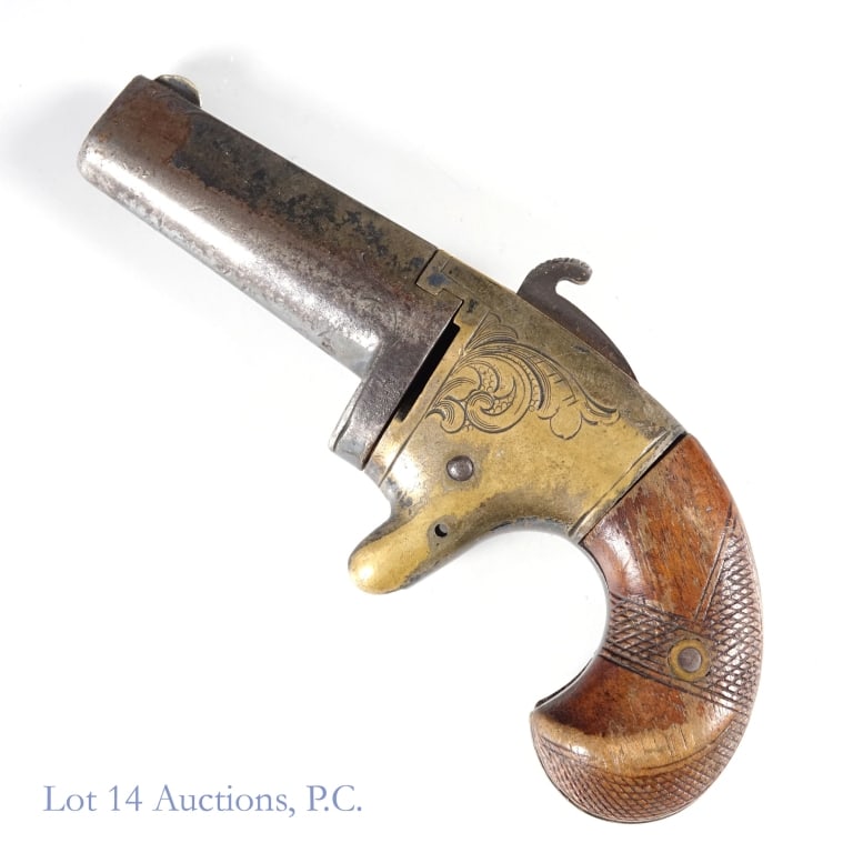 National Arms Company Derringer Pistol: National Arms Company Derringer Pistol. (Named for Henry Deringer [sic]). No trigger and missing the bolt or rivet which would attach the barrel. S/N 5785 engraved on bottom of barrel. Hammer will not