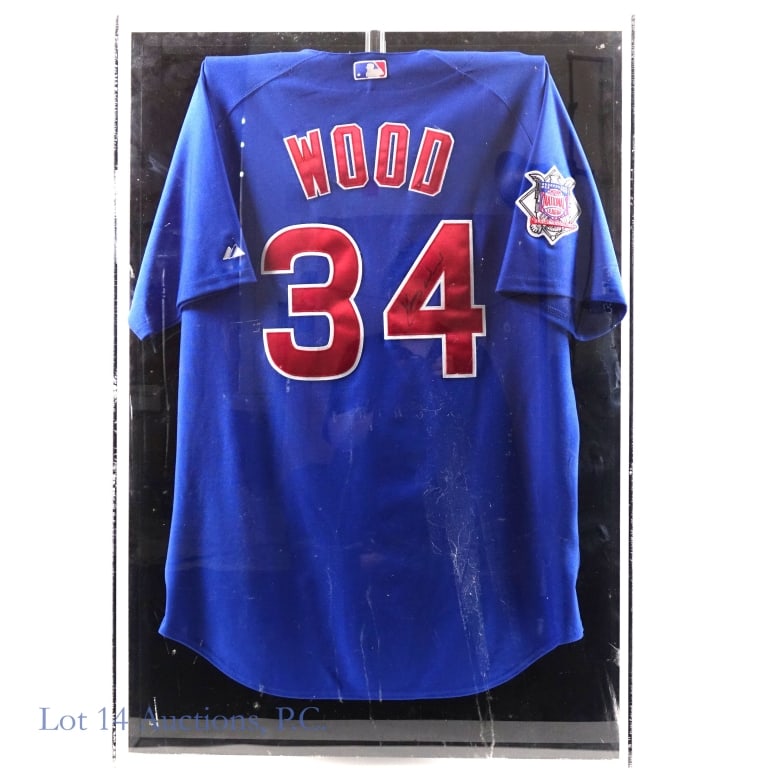 Kerry Wood Signed & Framed Jersey AS IS: LOCAL PICK UP OR THIRD PARTY SHIPPING ONLY - LOT 14 WILL NOT SHIP THIS ITEM Chicago Cubs jersey signed across the back on the number four by Kerry Wood. Wood used a black Sharpie type pen when he sign
