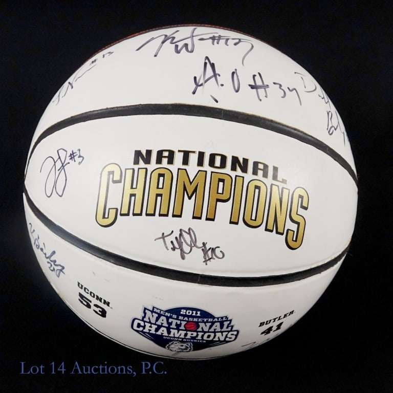 2011 UCONN Men's Signed Basketball: *** This lot is sold "as is" with no COAs or guarantees *** White paneled basketball with 2011 NCAA Men's Basketball Champion UCONN Huskies logo. Signatures include: Shabazz Napier (#13), Kemba Walker