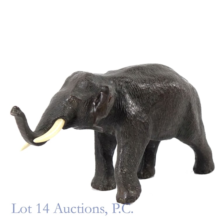 Japanese Meiji Period Bronze Elephant Signed: Japanese bronze elephant sculpture, Okimono. Meiji period (1868 - 1912). Trunk up. Signed on bottom. Approximately 6.25 x 3.1 x 2.65". 1.25 lbs. 570g.